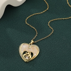 Golden heart necklace with mother and child pendant, zircon stones and mother of pearl inlay