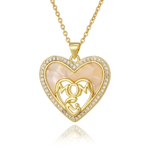 Macro shot of gold heart necklace with MOM lettering and mother-child silhouette detail