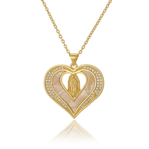 Detailed view of heart-shaped gold necklace with mother-of-pearl and crystal zircon