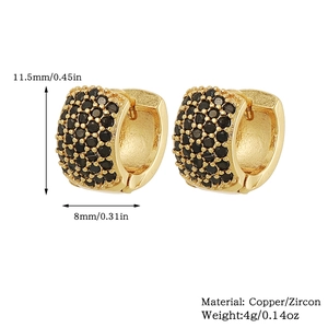 Detailed view of 18K gold plated copper huggie earrings with black zircon pavé settings