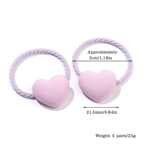 Detail showing lavender heart hair tie dimensions and flexible spiral elastic texture