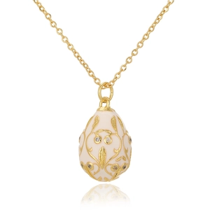 Golden Faberge style egg pendant necklace with white enamel and sparkling zircon stones