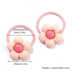 Vue détaillée des élastiques à fleurs montrant le diamètre de 3 cm et la fleur de 28 mm