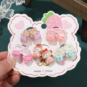 Détail de l'ensemble d'élastiques à cheveux pour enfants avec figurines mignonnes