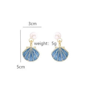 Detail of shell pearl earrings with blue enamel waves and size measurements