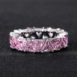 Eternity ring with pink triangle-cut cubic zirconia in silver-tone claw setting