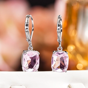 Detail of pink crystal drop earrings with silver leverback hooks and rectangular cut