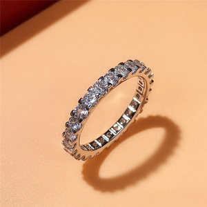 Sparkling eternity band ring with round brilliant cut stones in high quality silver finish