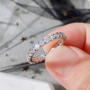 Silver geometric ring featuring brilliant round cubic zirconia stones in a claw setting