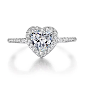 Elegant heart-shaped halo engagement ring with silver finish and micro-pave cubic zirconia