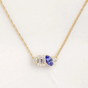 Birthstone water drop pendant necklace in gold with emerald-cut clear and blue stones