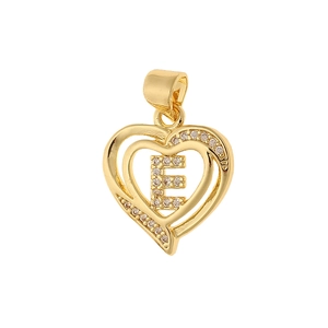 Detailed view of a gold heart pendant with cubic zirconia and the letter E inside