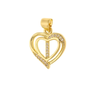 Close-up of gold heart pendant with letter I and micro-set cubic zirconia stones