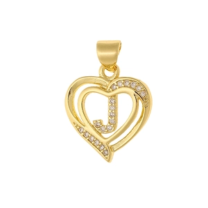 Macro detail of a heart-shaped gold pendant with cubic zirconia and letter J engraving