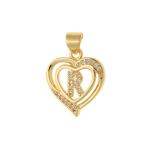 Detailed view of heart-shaped gold pendant with CZ-inlaid letter R and polished finish