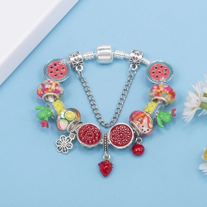 Silver plated snake chain bracelet featuring colorful fruit charms and enamel pendants