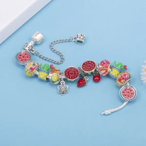 Silver snake chain bracelet with colorful fruit charms like watermelon and lemon