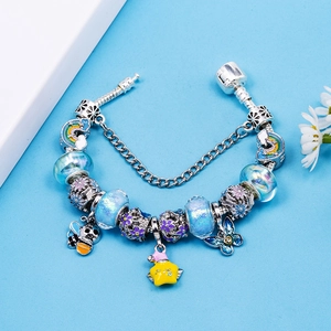 Cartoon charm bracelet with rainbow beads, honey bee, and blue butterfly pendants