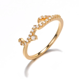 Elegant rose gold waved ring with sparkling pavé cubic zirconia at a 45-degree angle