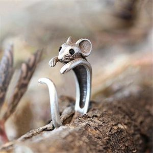 Vintage silver open ring featuring a cute mouse design with black eye accents on wood
