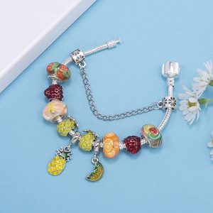 Colorful fruit charms bracelet with strawberry and pineapple on silver snake chain