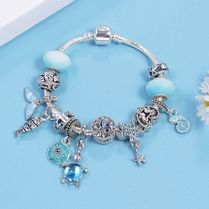 Marine charm bracelet with blue crystal beads and starfish pendant in silver finish