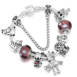 Bracciale snake in argento con ciondoli koala, gufo e perle di vetro viola lucide