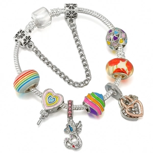 Rainbow beaded charm bracelet with dreamcatcher and pink heart pendants on snake chain