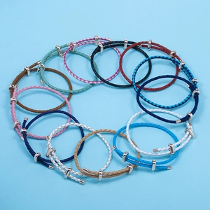 Adjustable woven leather bracelet in multiple colors with rose gold pull string sliders