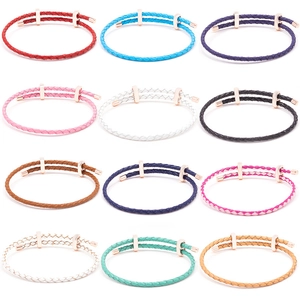 Braided leather bracelets in twelve colors with rose gold adjustable sliding buckles
