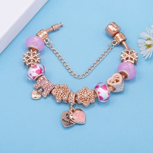Bracciale a maglia serpente in oro rosa con perle di cristallo viola e ciondoli cuore