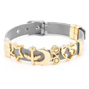 Detail of adjustable stainless steel mesh bracelet with gold star and moon charms