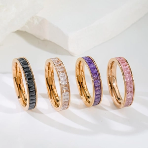Set of four gold-plated titanium steel rings with colorful zircon baguette crystals