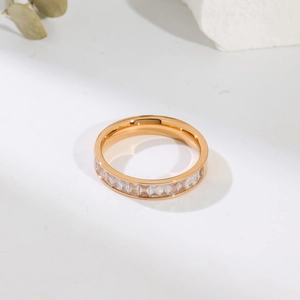 Gold plated stainless steel eternity ring with rectangular zircons on white stone