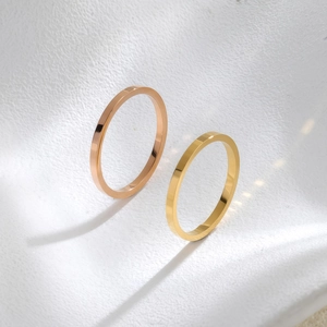 Minimalist polished stainless steel open rings in rose gold and gold finish with shadows