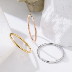 Three-piece minimalist titanium steel rings with cubic zirconia in gold and rose gold