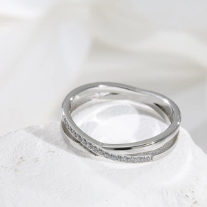 Elegant silver-toned double layer criss-cross ring with sparkling zircon pavé on matte base