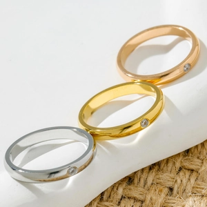 Three-color titanium steel couple rings with sparkling zircon inlay in minimalist design
