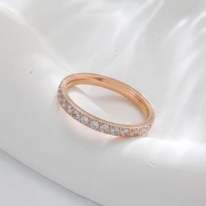 Minimalist rose gold eternity ring with round-cut sparkling diamonds for men and women