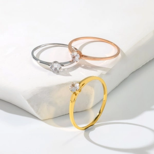 Classic six-prong solitaire rings in silver, rose gold, and gold finishes for women