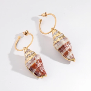 Bohemian gold conch shell drop earrings with natural spiral texture and polished metal hoops