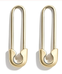 Detailed view of gold plated safety pin earrings featuring micro-set zircon stones