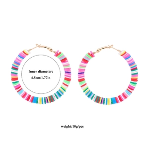 Detail view of Bohemian C-shape hoop earrings showing 4.5cm diameter and 10g weight