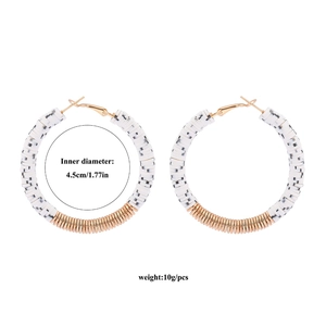 Detail showing 4.5cm inner diameter and 10g weight of white clay bead hoop earrings