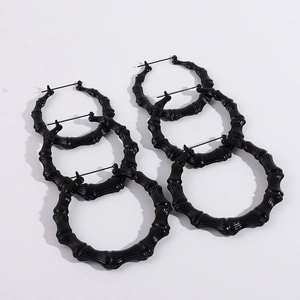 Three pairs of black bamboo-style hoop earrings in large, medium, and small sizes set