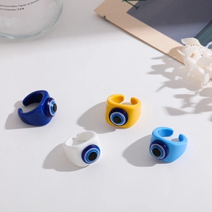 Unique resin Evil Eye open rings in blue and yellow colors with adjustable bands