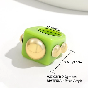Detail view of 4pcs green resin rings with gold beads and exact size measurements