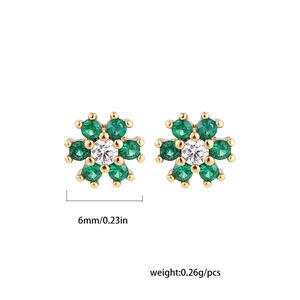 Detail view of flower stud earrings with green petals and center gemstone 6mm diameter