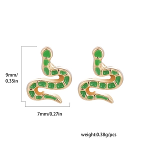 Detailed view of green enamel snake stud earrings in gold finish with size dimensions