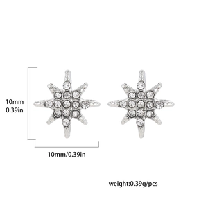 Macro view showing dimensions of octagonal star earrings with white rhinestones